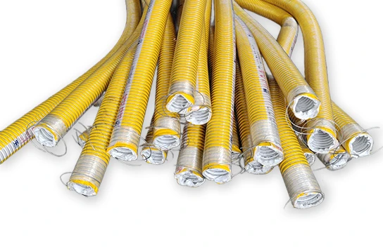 Multiple yellow fuel oil suction and discharge flexible composite hoses without fittings placed on the ground