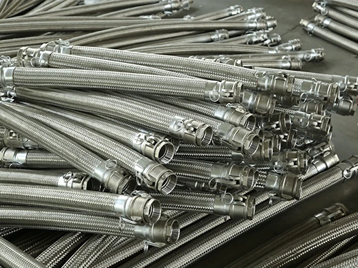 Multiple braided metal hoses with joints stacked together