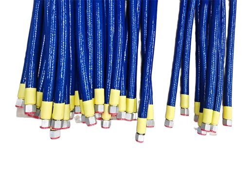 Multiple blue metal hoses with installation joints and fireproof sleeves